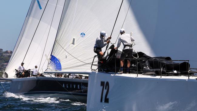 Crew aboard the yachts Alive and URM competed in the Big Boat Challenge along with supermaxis. Pic: David Gray/AFP.