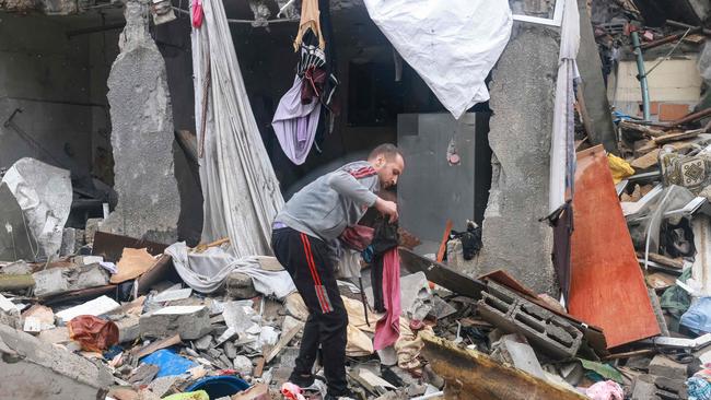 A Palestinian man inspects the damages amid the rubble following Israeli bombardment in Rafah in the southern Gaza Strip which was meant to be a safe zone. Picture: Mohammed Abed