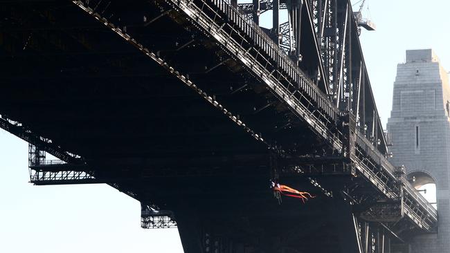 Greenpeace protesters abseiled off Sydney Harbour Bridge to protest climate change in May 2019. Picture: Richard Dobson