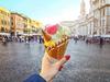 ESCAPE: How I travel, Celeste Mitchell -  Italian ice - cream cone held in hand on the background of Piazza Navona in Rome , Italy  Picture: Istock