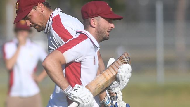 Jake Kroehnert and Jack Weatherstone cross ends for Brothers against GDSC Easts/Jacaranda Hotel Westlawn at McKittrick Park.