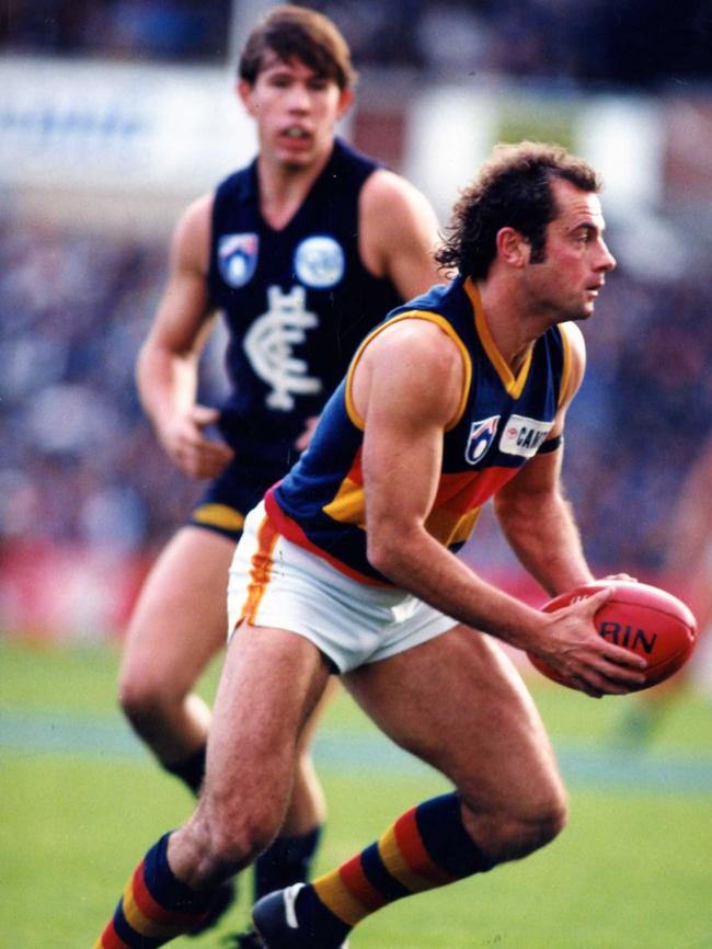 Tony McGuinness in action for the Crows in a clash against Carlton in 1993. Picture: News Corp