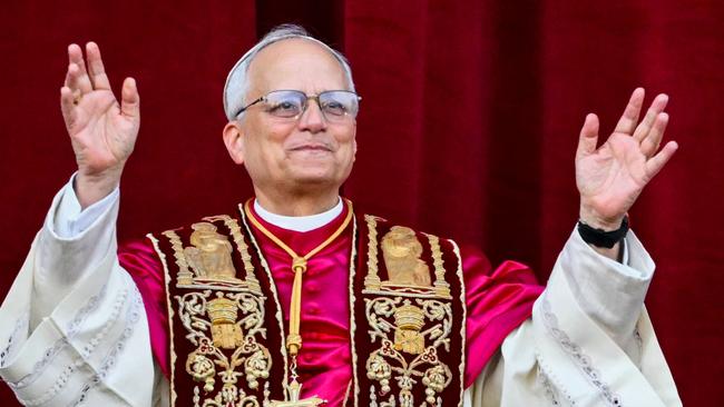 Newly elected Pope Leo XIV, Robert Prevost arrives on the main central loggia balcony of the St Peter's Basilica for the first time on May 8. Picture: AFP