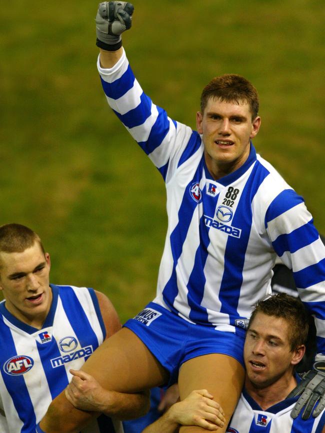 Jason McCartney leaves the ground after his comeback AFL game.