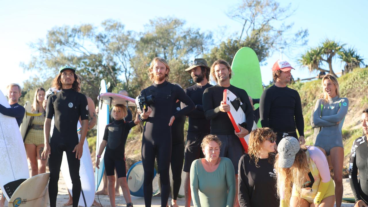 Members of the public took part in a paddle-out at Byron Bay's Main Beach to protest against the planned Netflix reality show Byron Baes on the morning of Tuesday, April 20, 2021. Picture: Liana Boss