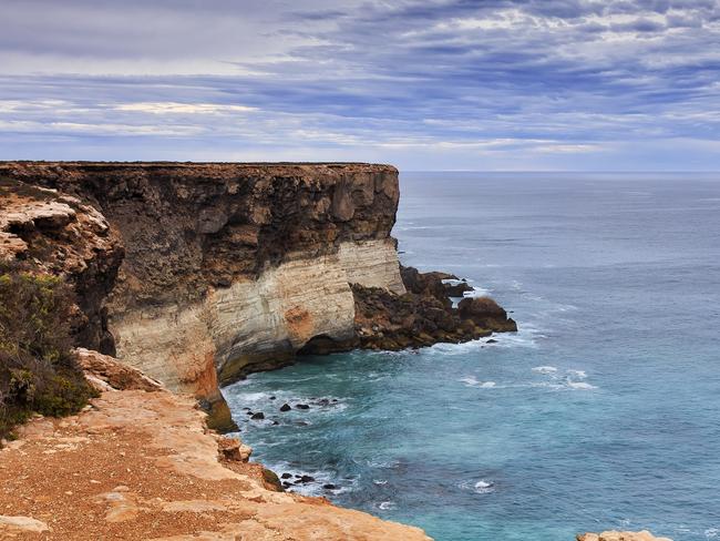 ESCAPE: Nullarbor, Jennifer Ennion -  Bend of rocky dangerous geological limestone Nullarbor plato towards Great Australian bight in South Australia on a cloudy say. Picture: Istock