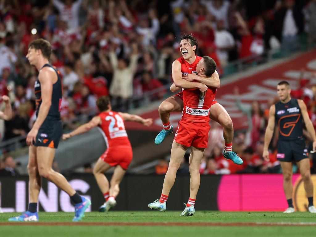 SYDNEY, AUSTRALIA - SEPTEMBER 07: Errol Gulden of the Swans and Chad Warner of the Swans celebrate winning the AFL First Qualifying Final match between Sydney Swans and Greater Western Sydney Giants at Sydney Cricket Ground, on September 07, 2024, in Sydney, Australia. (Photo by Cameron Spencer/Getty Images)