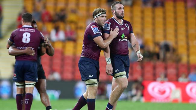 BRISBANE, AUSTRALIA - MAY 03: Angus Scott-Young and Izack Rodda of the Reds celebrate winning the round 12 Super Rugby match between the Reds and the Sunwolves at Suncorp Stadium on May 03, 2019 in Brisbane, Australia. (Photo by Chris Hyde/Getty Images for SUNWOLVES)