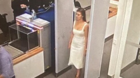 CCTV of Brittany Higgins entering Parliament House in a white dress. Picture: 7 News Spotlight