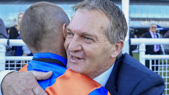 Trainer Kerry Parker hugging jockey Nash Rawiller after Think It Over won the Queen Elizabeth Stakes in 2022. Picture: Jenny Evans/Getty Images