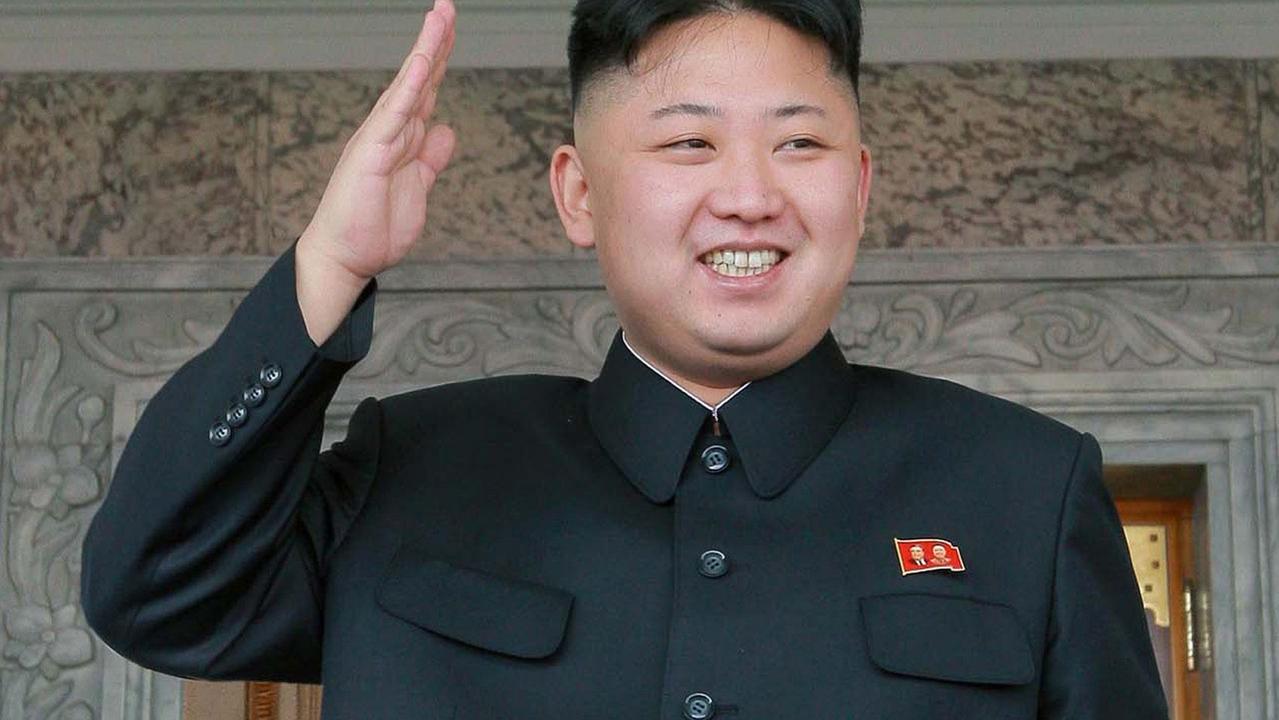 Kim Jong-un enjoying himself at a military parade. Pic: AFP/KCNA