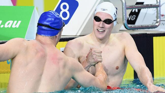 Mack Horton is congratulated by Kyle Chalmers after winning the 200m freestyle. Picture: Getty Images