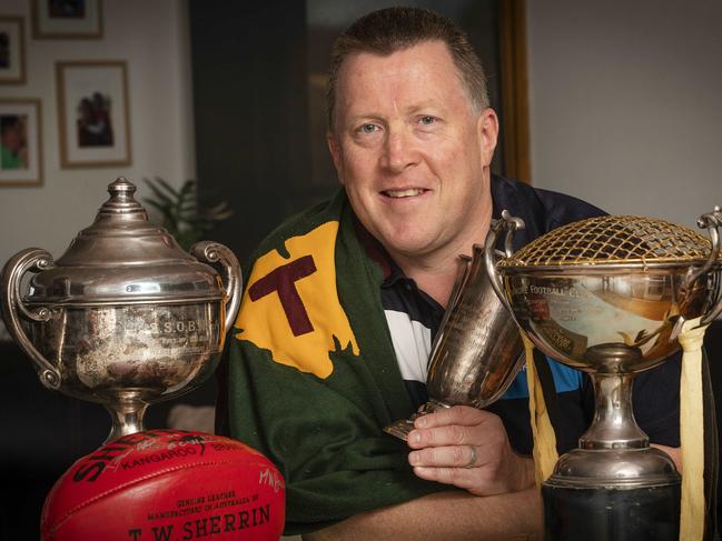 Damien Dillon and his footy memorabilia at Howrah. Picture: Chris Kidd