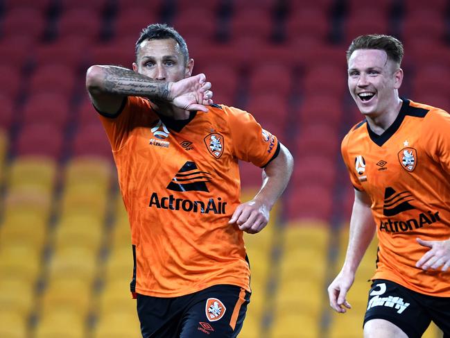 Scott McDonald (left) and Corey Brown celebrate a Brisbane Roar goal. Picture: AAP Image/Dan Peled