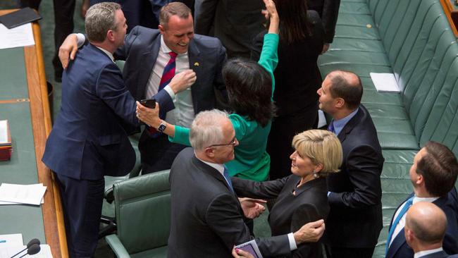 Mr Turnbull and Foreign Minister Julie Bishop embrace after the Same-Sex Marriage Bill was passed in the federal Parliament on December 7. Picture: Sean Davey