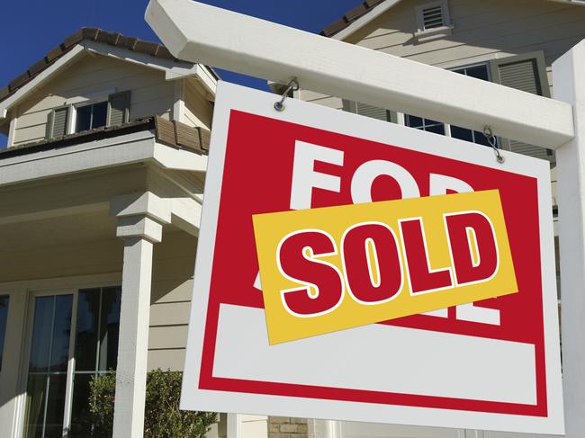 Sold Home For Sale Sign in Front of New House