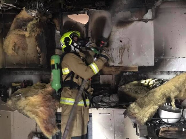 Emergency crews had to break a window to get inside the house before quickly extinguishing the fire with minimal use of water. Picture: FRNSW Hornsby