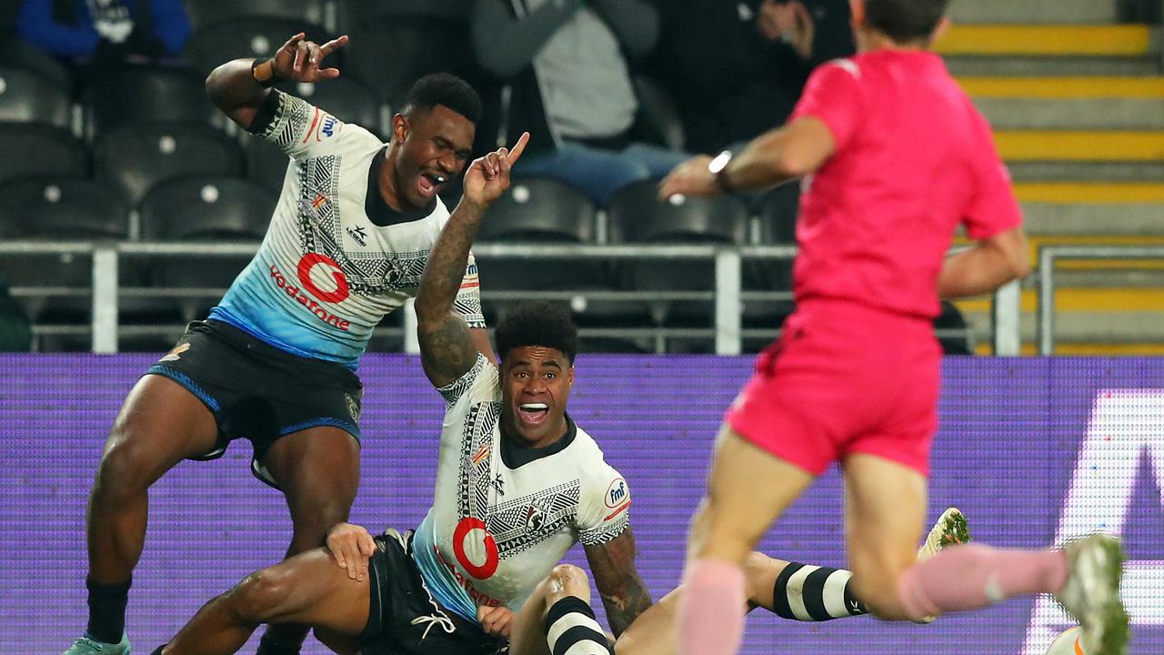HULL, ENGLAND - NOVEMBER 05: Kevin Naiqama of Fiji celebrates their sides third try during the Rugby League World Cup Quarter Final match between New Zealand and Fiji at MKM Stadium on November 05, 2022 in Hull, England. (Photo by Alex Livesey/Getty Images for RLWC)