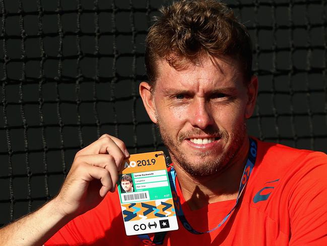 James Duckworth celebrates winning his match against Luke Saville to make the main draw of the Australian Open. 