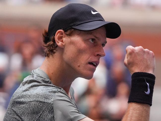 Italy's Jannik Sinner reacts during his men's semifinals match against Britain's Jack Draper on day twelve of the US Open tennis tournament at the USTA Billie Jean King National Tennis Center in New York City, on September 6, 2024. (Photo by TIMOTHY A. CLARY / AFP)