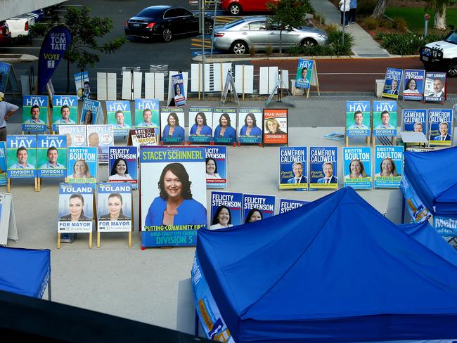 Council candidate signage at the Helensvale Library pre polling venue Pic by David Clark