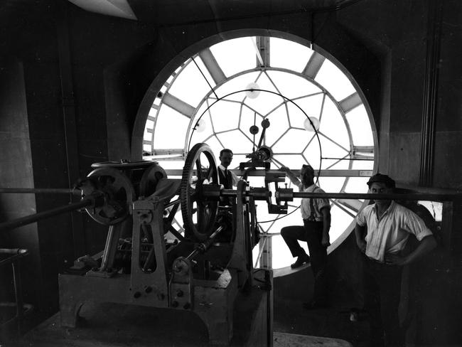 Workers testing the Central Station clocktower mechanism, circa 1924.