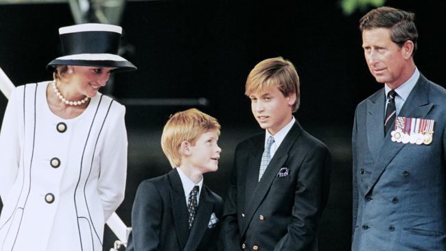 Princess Diana and Prince Charles with their young sons in 1995. Credit: AFP Photo/Johnny Eggitt