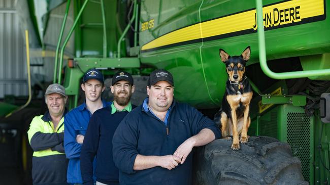 Peel Ag employees (from left) Graeme White, Peter Cornwall, Michael Bieser and farm manager Tom Upton with Didge the Kelpie at Inverleigh. Picture: Zoe Phillips