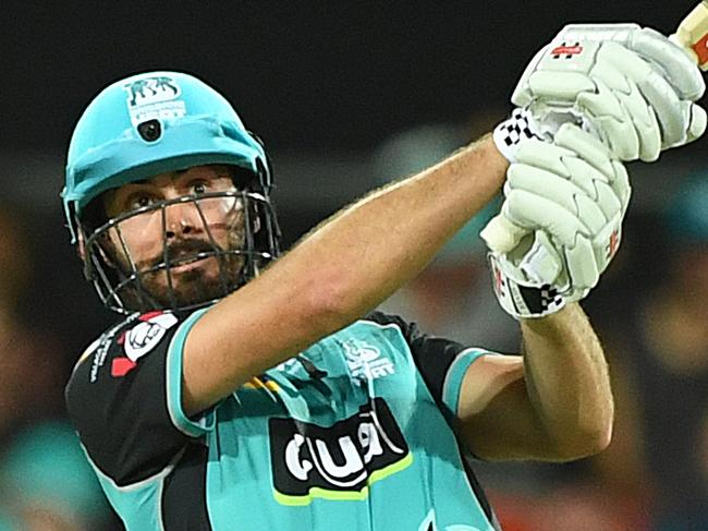 Ben Cutting of the Heat plays a shot during the Big Bash League (BBL) match between the Brisbane Heat and the Hobart Hurricanes at Metricon Stadium on the Gold Coast, Saturday, December 22, 2018. (AAP Image/Dave Hunt) NO ARCHIVING, EDITORIAL USE ONLY, IMAGES TO BE USED FOR NEWS REPORTING PURPOSES ONLY, NO COMMERCIAL USE WHATSOEVER, NO USE IN BOOKS WITHOUT PRIOR WRITTEN CONSENT FROM AAP