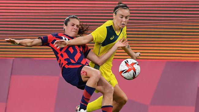 USA's defender Kelley O'Hara (L) fights for the ball with Australia's forward Caitlin Foord. Picture: AFP