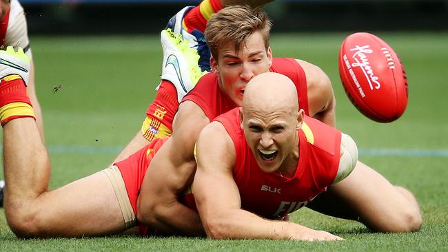 Gary Ablett is crunched in a Jack Viney tackle. Picture: Colleen Petch