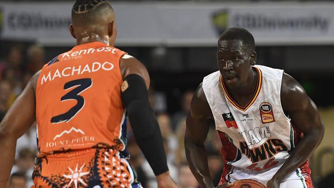 CAIRNS, AUSTRALIA – JANUARY 31: Sunday Tech of the Hawks looks to get past Scott Machado of the Taipans during the round 18 NBL match between the Cairns Taipans and the Illawarra Hawks at the Cairns Convention Centre on January 31, 2020 in Cairns, Australia. (Photo by Ian Hitchcock/Getty Images)