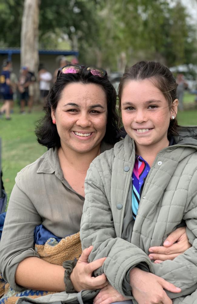 Shonnah Conlon and daughter Ava Conlon, of Ooralea, were barracking for brothers at the Mackay Rugby Union Anzac Day clash at Cathy Freeman Oval in Slade Point. Saturday, April 23, 2022. Picture: Tara Miko