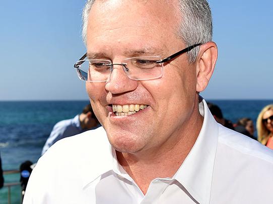 Prime Minister Scott Morrison says he's more of a Tina Arena fan after a video was uploaded to his social media accounts showing Coalition MPs raising their hands to Fatman Scoop's Be Faithful. Picture: Joel Carrett/Tim Hunter