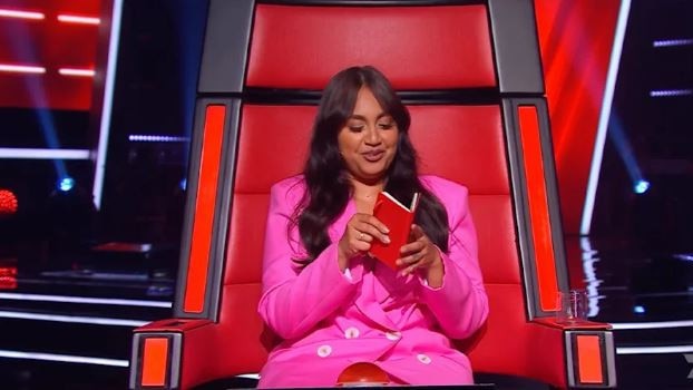 Producers write instructions in the red book for the judges, including Jessica Mauboy.