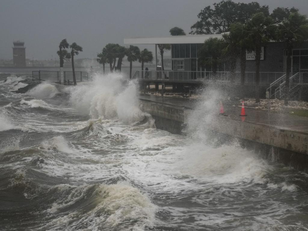 Waves crash along St. Pete Pier in St. Petersburg, Florida.