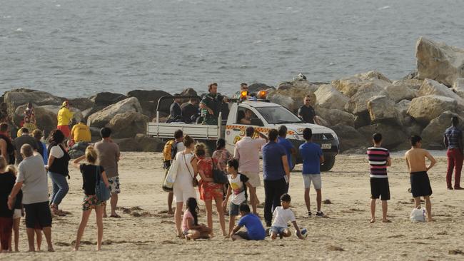 Horrified onlookers at the scene. Picture: Bianca De Marchi