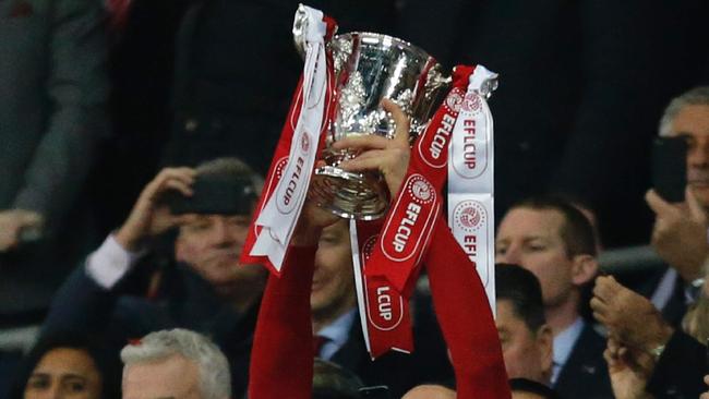 Man of the match, Manchester United's Swedish striker Zlatan Ibrahimovic lifts the trophy as Manchester United players celebrate their victory after the English League Cup final football match between Manchester United and Southampton at Wembley stadium in north London on February 26, 2017. Picture: Ian Kington/AFP