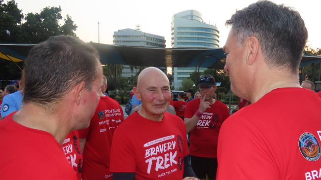 NT Administrator Hugh Heggie was in good spirits after the run and had a quick chat to Solomon MP Luke Gosling (left) and Deputy Prime Minister Richard Marles (right).