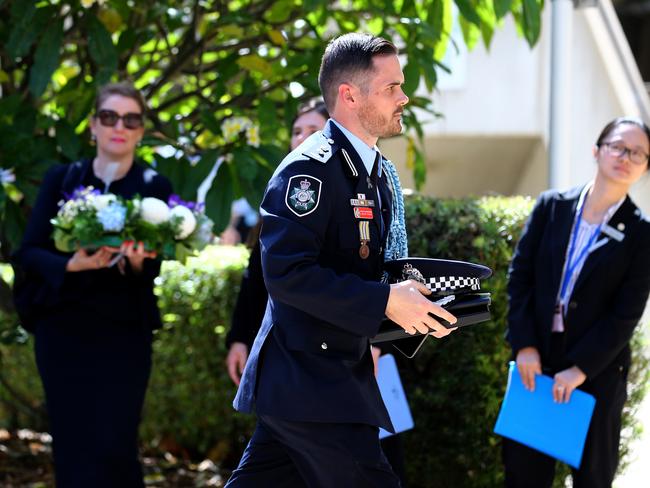 Mourners at the memorial service with full police honours for constables Rachel McCrow and Matthew Arnold at Brisbane Entertainment Centre. Picture: David Clark