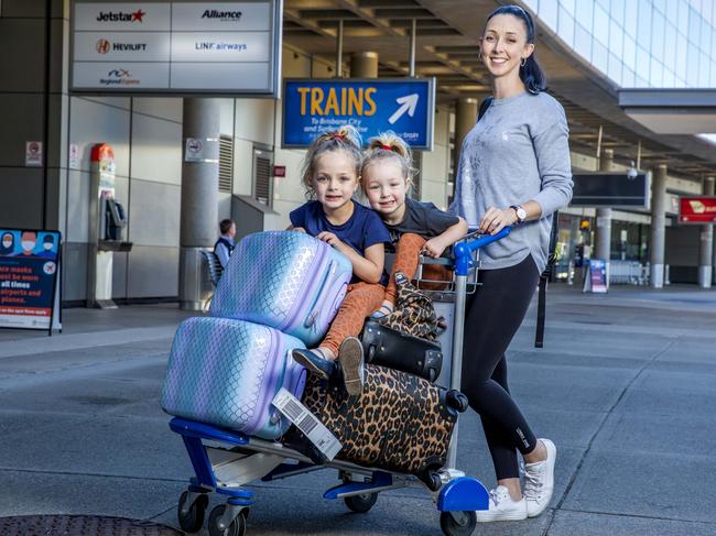 Emma-Lee Allan with six-year-old Charlotte and three-year-old Vivienne at Brisbane Domestic Terminal, Monday, May 3, 2021 – Picture: Richard Walker