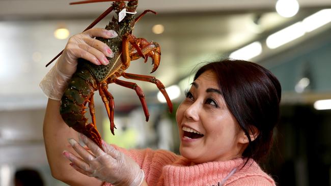 Sally Lam, pictured with some of the seafood available at the Golden Seafood Market in Canley Heights.