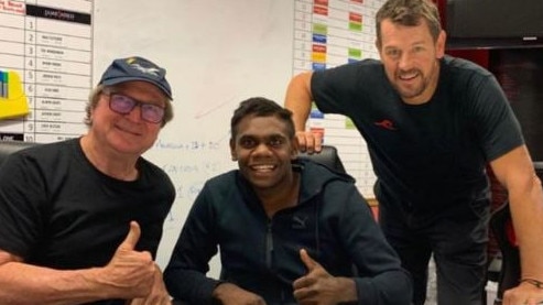 Irving Mosquito with Kevin Sheedy and Mark Harvey during his time with the Bombers.