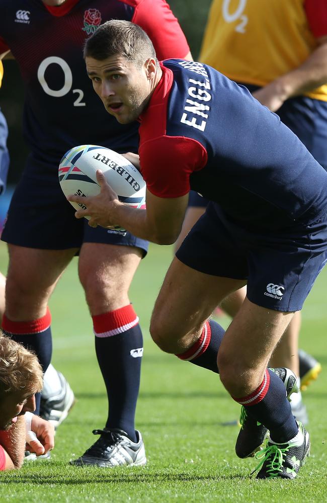 Richard Wigglesworth runs with the ball during the England training session at Pennyhill Park.