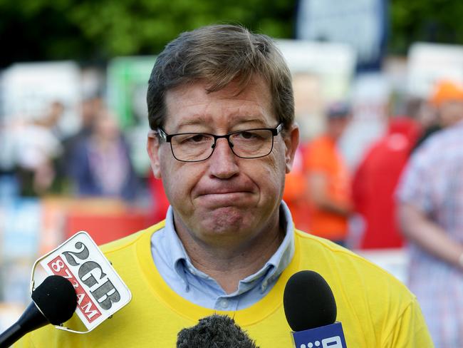 A glum looking Nationals leader Troy Grant speaks to the media during voting at the Orange by-election. Picture: Jonathan Ng