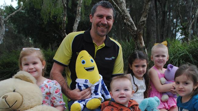 Cr Darren Grimwade and some young friends getting ready for the Teddy Bears' Picnic.