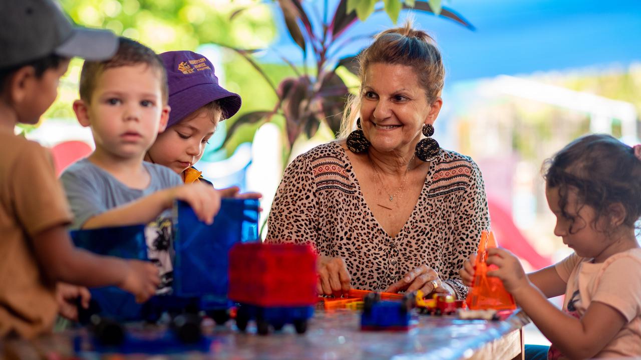 Irene Billias has been named the NT's favourite childcare educator. She is joined here by Arjun Pushpala, Costa Billias, Marianthi Kotis, and Sevasti Skartados. Picture: Che Chorley