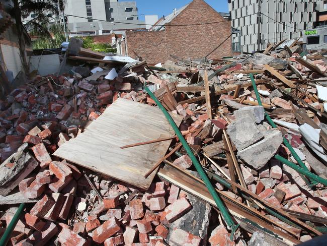 State Government will consider higher penalties against illegal demolitions after an historic Carlton pub, the Corkman, was flattened over the weekend. Picture of the rubble in Carlton where the pub was.Tuesday, Oct 2016. Picture: David Crosling