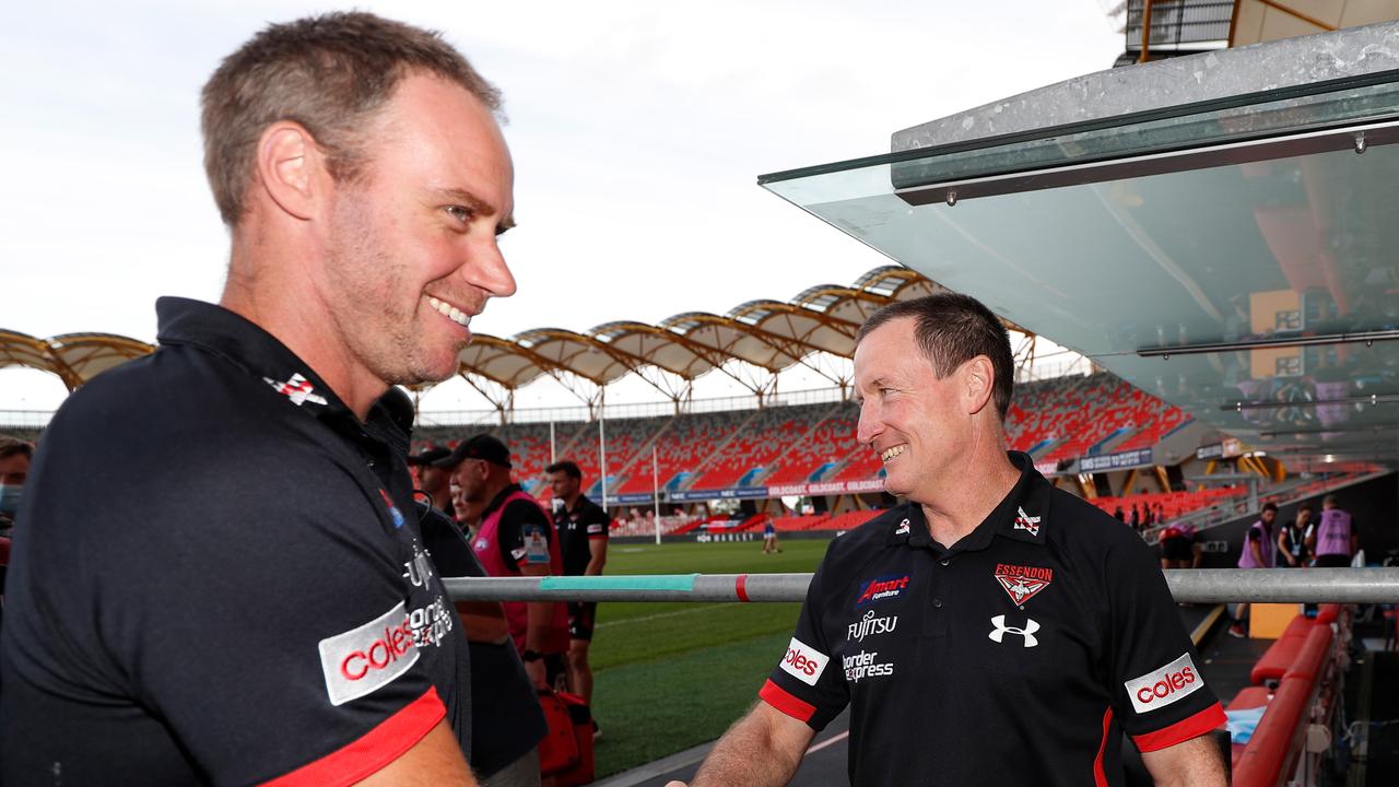 John Worsfold (right) has handed over the reins to Ben Rutten for this season. Will Essendon perform better under only one coach? Picture: Michael Willson/AFL Photos via Getty Images