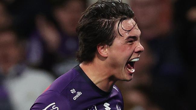 MELBOURNE, AUSTRALIA - AUGUST 24: Jack Howarth of the Storm celebrates scoring a try during the round 25 NRL match between Melbourne Storm and Dolphins at AAMI Park, on August 24, 2024, in Melbourne, Australia. (Photo by Daniel Pockett/Getty Images)